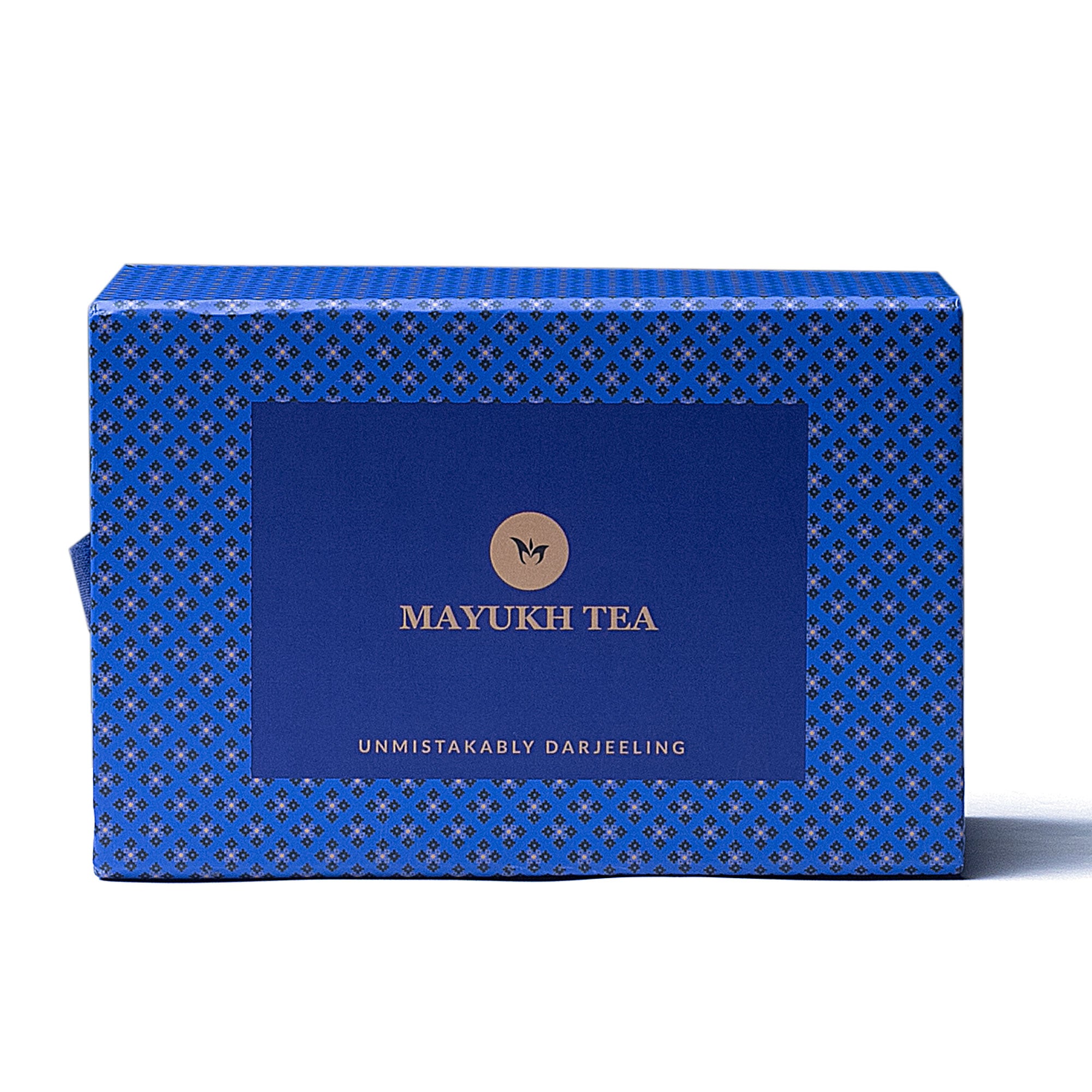 A golden cup of Arya Diamond First Flush Darjeeling black tea 2025 showing delicate floral and nutty notes