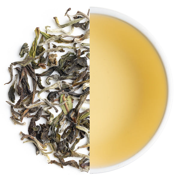 Freshly brewed Poobong First Flush Darjeeling Black Tea 2025 in a cup, showcasing amber-golden color