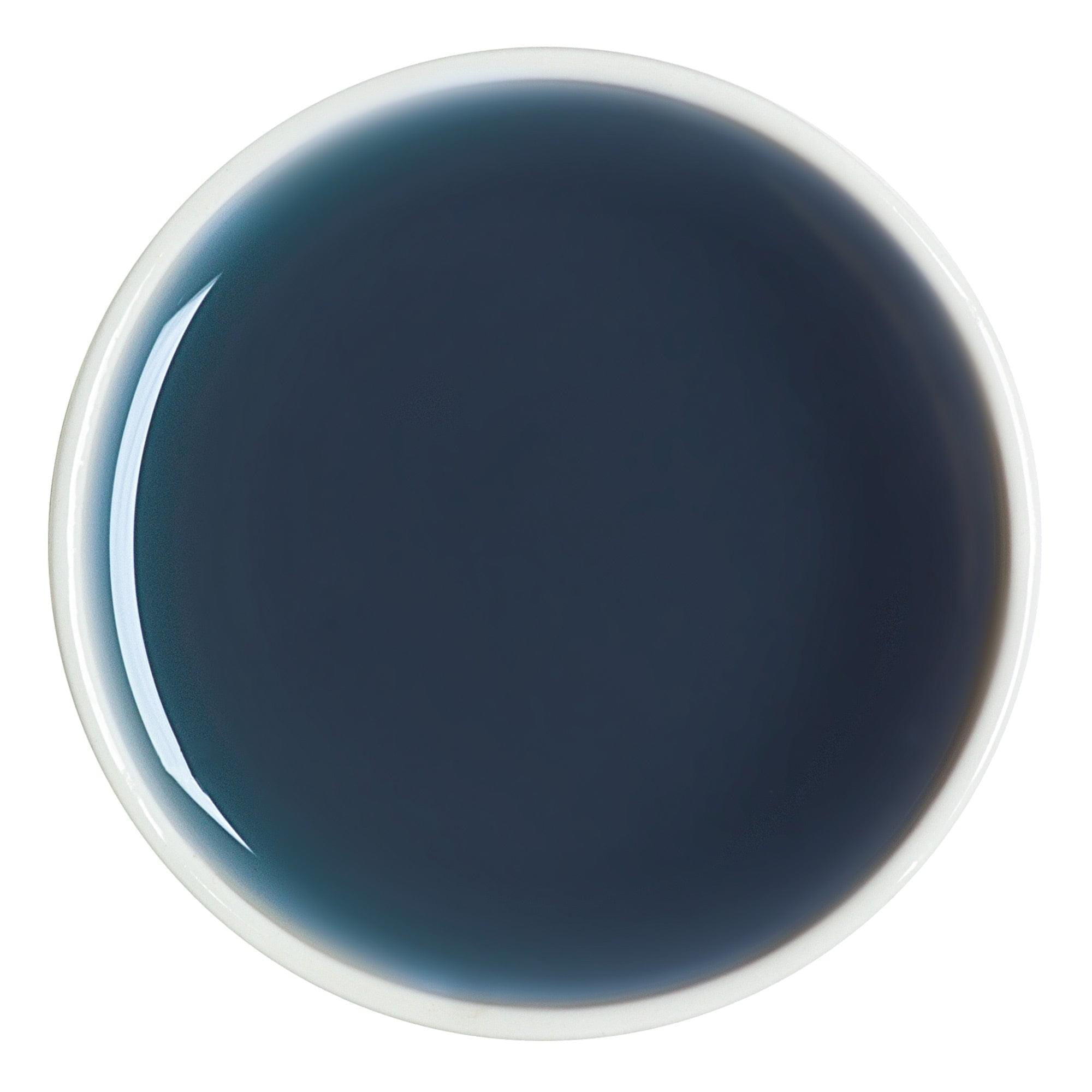 Butterfly pea blue tea showing vivid sapphire blue liquor